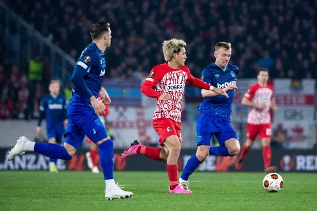 Ritsu Doan SC Freiburg, 42 in duel with James Ward Prowse West Ham United, 07 , GER, SC Freiburg vs West Ham United, Football UEFA Europa League, round of 16 first leg, 2023 2024 season, 07 03 2024 GER, SC Freiburg vs West Ham United, Football UEFA Europa League, round of 16 first leg, 2023 2024 season, 07 03 2024 Freiburg Copyright: xEibner-Pressefoto Memmlerx EP_MMR