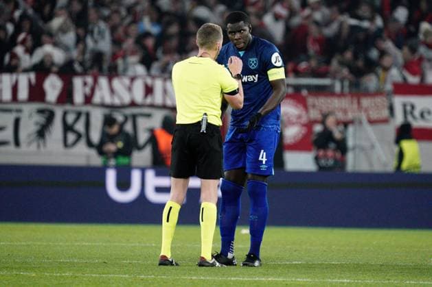 Kurt Zouma of West Ham seek explanations from the referee as to why no additional time was played following a lengthy but unsuccessful VAR check for a West Ham penalty at the end of the match Freiburg v West Ham United, UEFA Europa League, Round of 16, First Leg, Football, Stade Europa-Park, Freiburg, Germany - 07 Mar 2024 EDITORIAL USE ONLY No use with unauthorised audio, video, data, fixture lists, club league logos or live services. Online in-match use limited to 120 images, no video emulation. No use in betting, games or single club league player publications. Copyright: xDavexWinter Shutterstockx 14373670cn