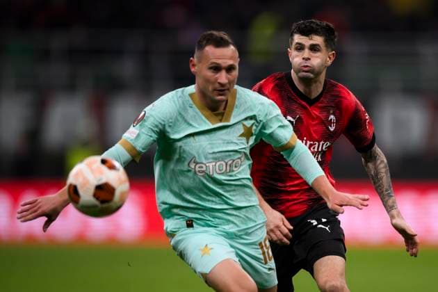 AC Milan v SK Slavia Praha - UEFA Europa League Christian Pulisic of AC Milan competes for the ball with Jan Boril of SK Slavia Praha during the UEFA Europa League round of 16 first leg football match between AC Milan and SK Slavia Praha. Milan Italy Copyright: xNicolòxCampox