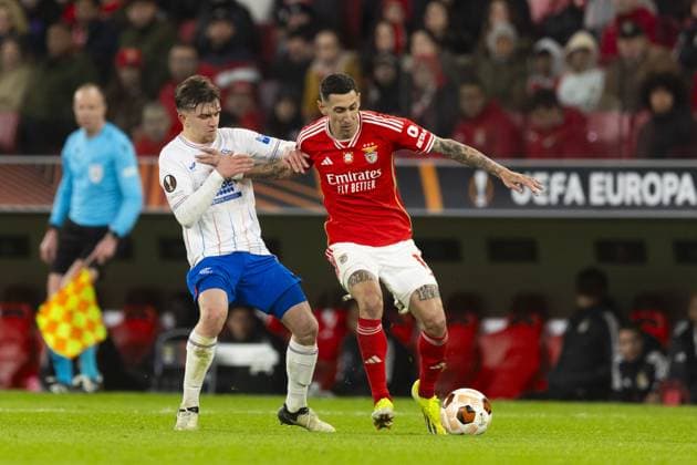 Ridvan Yilmaz of Rangers battles for the ball with Angel Di Maria of Benfica during the Europa League Round of 16 Match at the Estadio da Luz, Lisbon. Benfica v Rangers, UEFA Europa League, Round of 16, First Leg, Football, Estadio da Luz, Lisbon, Portugal - 07 Mar 2024 EDITORIAL USE ONLY No use with unauthorised audio, video, data, fixture lists, club league logos or live services. Online in-match use limited to 120 images, no video emulation. No use in betting, games or single club league player publications. Copyright: xLukexNickerson RangersxFC Shutterstockx 14380036fw