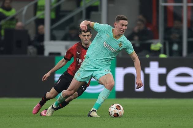 Milan, Italy, 7th March 2024. Lukas Provod of Slavia Praha is pursued by Christian Pulisic of AC Milan during the UEFA Europa League match at Giuseppe Meazza, Milan. Picture credit should read: Jonathan Moscrop Sportimage EDITORIAL USE ONLY. No use with unauthorised audio, video, data, fixture lists, club league logos or live services. Online in-match use limited to 120 images, no video emulation. No use in betting, games or single club league player publications. SPI-2971-0049