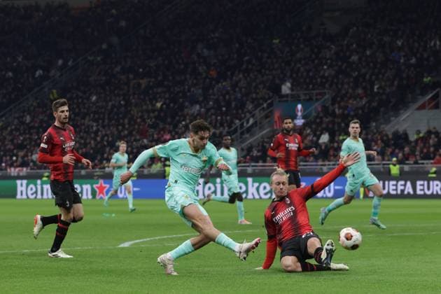 Milan, Italy, 7th March 2024. Matteo Gabbia of AC Milan looks on as team mate Simon Kjaer attempts to block a shot from Mojmir Chytil of Slavia Praha the UEFA Europa League match at Giuseppe Meazza, Milan. Picture credit should read: Jonathan Moscrop Sportimage EDITORIAL USE ONLY. No use with unauthorised audio, video, data, fixture lists, club league logos or live services. Online in-match use limited to 120 images, no video emulation. No use in betting, games or single club league player publications. SPI-2971-0068