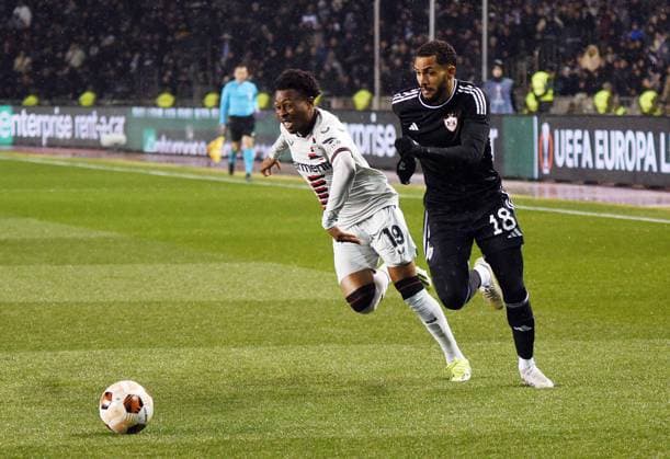 (240308) -- BAKU, March 8, 2024 -- Juninho (R) of Azerbaijan s Qarabag FK vies with Nathan Tella of Germany s Bayer Leverkusen FC during the UEFA Europa League round of 16 first leg football match between Qarabag FK and Bayer 04 Leverkusen in Baku, Azerbaijan, March 7, 2024. (Photo by Tofiq Babayev Xinhua) (SP)AZERBAIJAN-BAKU--2024 UEFA EUROPA LEAGUE LixMing 
