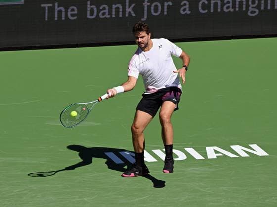 INDIAN WELLS, CA - MARCH 07: Stan Wawrinka (SUI) returns the ball during an ATP, Tennis Herren tennis match played on March 7, 2024 at the BNP Paribas Open at the Indian Wells Tennis Garden in Indian Wells, CA. (Photo by John Cordes Icon Sportswire) TENNIS: MAR 07 BNP Paribas Open EDITORIAL USE ONLY Icon506240307006
