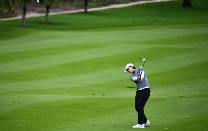 (240308) -- LINGSHUI, March 8, 2024 -- An Narin of South Korea plays a shot during the second round of the Blue Bay LPGA, Golf Damen golf tournament in Lingshui, south China s Hainan Province, March 8, 2024. ) (SP)CHINA-HAINAN-LINGSHUI-GOLF-BLUE BAY LPGA (CN) YangxGuanyu 