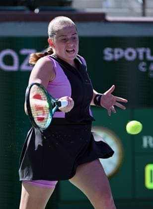 INDIAN WELLS, CA - MARCH 08: Jelena Ostapenko (LAT) returns the ball during a WTA, Tennis Damen tennis match played on March 8, 2024 during the BNP Paribas Open played at the Indian Wells Tennis Garden in Indian Wells, CA. (Photo by John Cordes Icon Sportswire) TENNIS: MAR 08 BNP Paribas Open EDITORIAL USE ONLY Icon506240308008