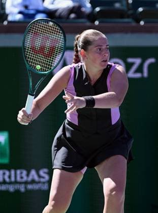 INDIAN WELLS, CA - MARCH 08: Jelena Ostapenko (LAT) waits for the ball during a WTA, Tennis Damen tennis match played on March 8, 2024 during the BNP Paribas Open played at the Indian Wells Tennis Garden in Indian Wells, CA. (Photo by John Cordes Icon Sportswire) TENNIS: MAR 08 BNP Paribas Open EDITORIAL USE ONLY Icon506240308010