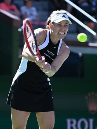 INDIAN WELLS, CA - MARCH 08: Angelique Kerbar (GER) returns the ball during a WTA, Tennis Damen tennis match played on March 8, 2024 during the BNP Paribas Open played at the Indian Wells Tennis Garden in Indian Wells, CA. (Photo by John Cordes Icon Sportswire) TENNIS: MAR 08 BNP Paribas Open EDITORIAL USE ONLY Icon506240308020