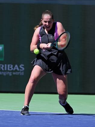 INDIAN WELLS, CA - MARCH 08: Jelena Ostapenko (LAT) returns the ball during a WTA, Tennis Damen tennis match played on March 8, 2024 during the BNP Paribas Open played at the Indian Wells Tennis Garden in Indian Wells, CA. (Photo by John Cordes Icon Sportswire) TENNIS: MAR 08 BNP Paribas Open EDITORIAL USE ONLY Icon506240308023