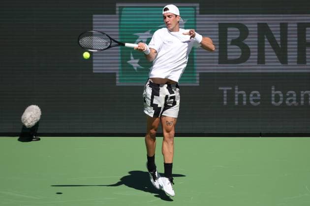 INDIAN WELLS, CA - MARCH 08: Thanasi Kokkinakis (AUS) hits a forehand during the BNP Paribas Open on March 8, 2024 at Indian Wells Tennis Garden in Indian Wells, CA. (Photo by George Walker Icon Sportswire) TENNIS: MAR 08 BNP Paribas Open EDITORIAL USE ONLY Icon240308004