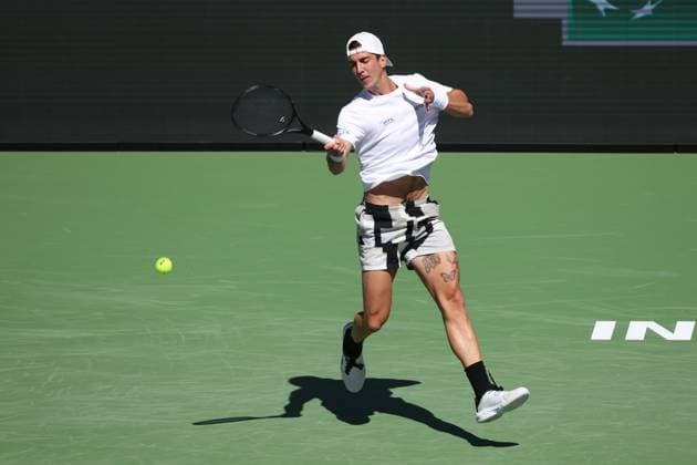 INDIAN WELLS, CA - MARCH 08: Thanasi Kokkinakis (AUS) hits a forehand during the BNP Paribas Open on March 8, 2024 at Indian Wells Tennis Garden in Indian Wells, CA. (Photo by George Walker Icon Sportswire) TENNIS: MAR 08 BNP Paribas Open EDITORIAL USE ONLY Icon240308007