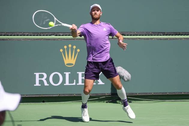 INDIAN WELLS, CA - MARCH 08: Constant Lestienne (FRA) hits a forehand during the BNP Paribas Open on March 8, 2024 at Indian Wells Tennis Garden in Indian Wells, CA. (Photo by George Walker Icon Sportswire) TENNIS: MAR 08 BNP Paribas Open EDITORIAL USE ONLY Icon240308018