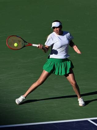 INDIAN WELLS, CA - MARCH 08: Donna Vekic (CRO) returns the ball during a WTA, Tennis Damen tennis match played on March 8, 2024 during the BNP Paribas Open played at the Indian Wells Tennis Garden in Indian Wells, CA. (Photo by John Cordes Icon Sportswire) TENNIS: MAR 08 BNP Paribas Open EDITORIAL USE ONLY Icon506240308117