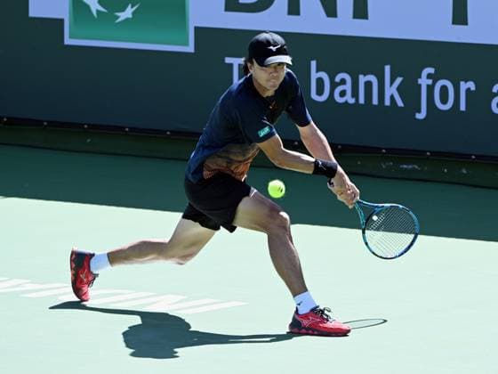INDIAN WELLS, CA - MARCH 08: Taro Daniel (JPN) gets ready to hit the ball during a ATP, Tennis Herren tennis match played on March 8, 2024 during the BNP Paribas Open played at the Indian Wells Tennis Garden in Indian Wells, CA. (Photo by John Cordes Icon Sportswire) TENNIS: MAR 08 BNP Paribas Open EDITORIAL USE ONLY Icon506240308166