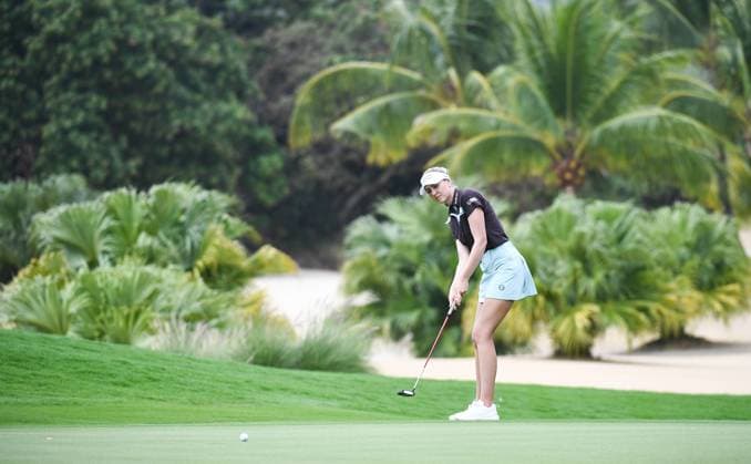 (240309) -- LINGSHUI, March 9, 2024 -- Olivia Cowan of Germany putts a shot during the third round of the Blue Bay LPGA, Golf Damen golf tournament in Lingshui, south China s Hainan Province, March 9, 2024. ) (SP)CHINA-HAINAN-LINGSHUI-GOLF-BLUE BAY LPGA (CN) YangxGuanyu 
