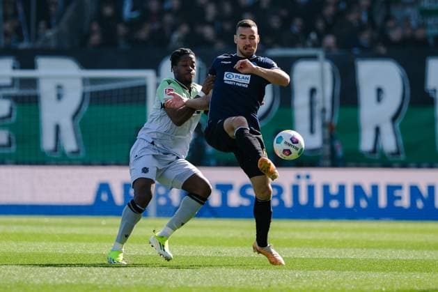 Bright Arrey Mbi Hannover 96, 4 in duel with Ivan Prtajin SV Wehen Wiesbaden, 18 , GER, SV Wehen Wiesbaden vs Hannover 96, Football, 2 Bundesliga, Matchday 25, Season 2023 2024, 09 03 2024 DFL REGULATIONS PROHIBIT ANY USE OF PHOTOGRAPHS AS IMAGE SEQUENCES AND OR QUASI VIDEO GER, SV Wehen Wiesbaden vs Hannover 96, Football, 2 Bundesliga, Matchday 25, Season 2023 2024, 09 03 2024 Wiesbaden Copyright: xEibner-Pressefoto FlorianxWieganx EP_FWD