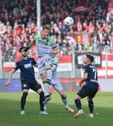 09 03 2024, xblx, Soccer 2 Bundesliga, SV Wehen Wiesbaden Hannover 96 emspor, v l Nikolas Agrafiotis SV Wehen Wiesbaden , Marcel Halstenberg Hannover 96 , Robin Heußer Heusser SV Wehen Wiesbaden DFL DFB REGULATIONS PROHIBIT ANY USE OF PHOTOGRAPHS as IMAGE SEQUENCES and or QUASI VIDEO Wiesbaden
