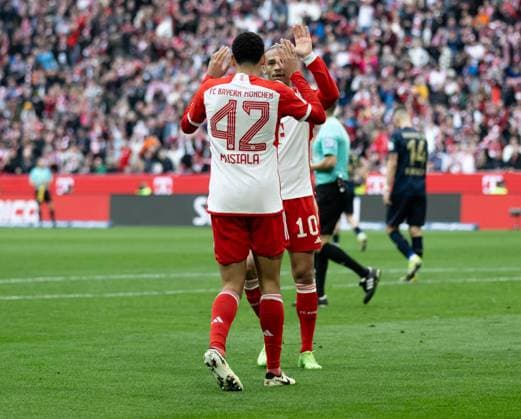 Leroy Sane FC Bayern Muenchen, 10 celebrates with Jamal Musiala FC Bayern Muenchen, 42 his goal for 5 1 GER, FC Bayern Muenchen vs 1 FSV Mainz 05, Football, Bundesliga, Matchday 25, Season 2023 2024, 09 03 2024 DFL DFB REGULATIONS PROHIBIT ANY USE OF PHOTOGRAPHS as IMAGE SEQUENCES and or QUASI VIDEO GER, FC Bayern Muenchen vs 1 FSV Mainz 05, Football, Bundesliga, Matchday 25, Season 2023 2024, 09 03 2024 Muenchen Copyright: xEibner-Pressefoto HeikexFeinerx EP_HFR