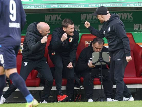 Final cheers at the Augsburg bench, vl Jacob Friis Co Coach FC Augsburg , Lars Knudsen Co Coach FC Augsburg , Remigius Elert Videoanalyst FC Augsburg , Jonas Scheuermann Co Coach FC Augsburg FC Augsburg vs 1 FC Heidenheim, 25 Matchday DFL REGULATIONS PROHIBIT ANY USE OF PHOTOGRAPHS AS IMAGE SEQUENCES AND OR QUASI VIDEO