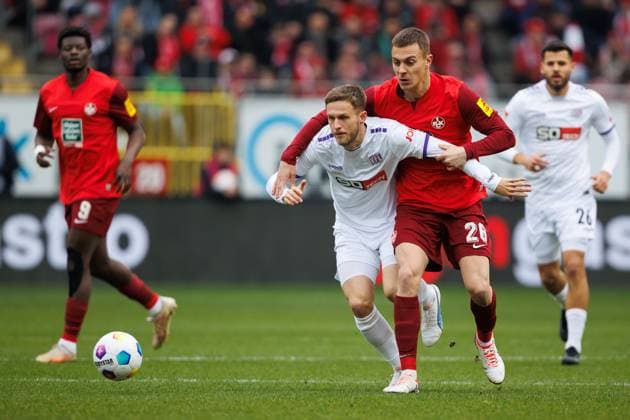 Filip Kaloc 1 FC Kaiserslautern in duel with Jannes Wulff VFL Osnabrueck , 1 FC Kaiserslautern vs VFL Osnabrueck, Soccer, 2 Bundesliga, Season 2023 2024, 10 03 2024 1 FC Kaiserslautern vs VFL Osnabrueck, Soccer, 2 Bundesliga, Season 2023 2024, 10 03 2024 Kaiserslautern Copyright: xEibner-Pressefoto AlexanderxNeisx EP_ANS