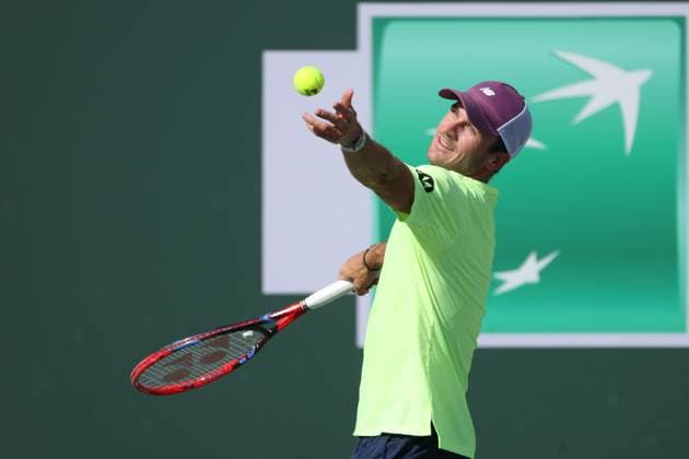 INDIAN WELLS, CA - MARCH 10: Tommy Paul (USA) serves during the BNP Paribas Open on March 10, 2024 at Indian Wells Tennis Garden in Indian Wells, CA. (Photo by George Walker Icon Sportswire) TENNIS: MAR 10 BNP Paribas Open EDITORIAL USE ONLY Icon240310089