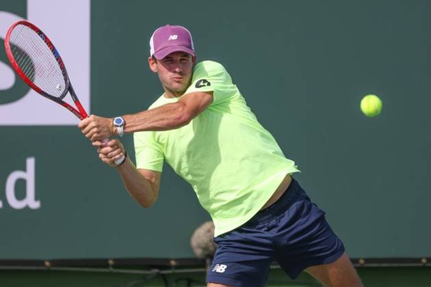 INDIAN WELLS, CA - MARCH 10: Tommy Paul (USA) hits a backhand during the BNP Paribas Open on March 10, 2024 at Indian Wells Tennis Garden in Indian Wells, CA. (Photo by George Walker Icon Sportswire) TENNIS: MAR 10 BNP Paribas Open EDITORIAL USE ONLY Icon240310099