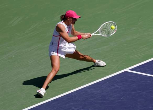 March 10, 2024 Iga Swiatek of Poland returns a shot against Linda Noskova of the Czech Republic during the BNP Paribas Open in Indian Wells, CA. CSM Indian Wells United States of America - ZUMAc04_ 20240310_zma_c04_086 Copyright: xCharlesxBausx