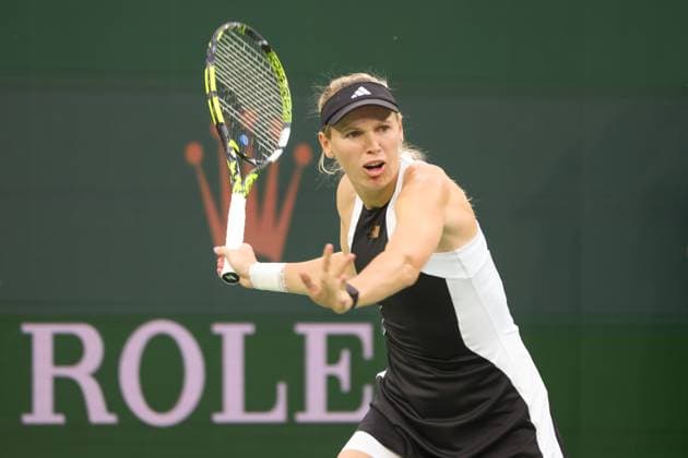 INDIAN WELLS, CA - MARCH 10: Caroline Wozniacki (DEN) hits a forehand during the BNP Paribas Open on March 10, 2024 at Indian Wells Tennis Garden in Indian Wells, CA. (Photo by George Walker Icon Sportswire) TENNIS: MAR 10 BNP Paribas Open EDITORIAL USE ONLY Icon240310118