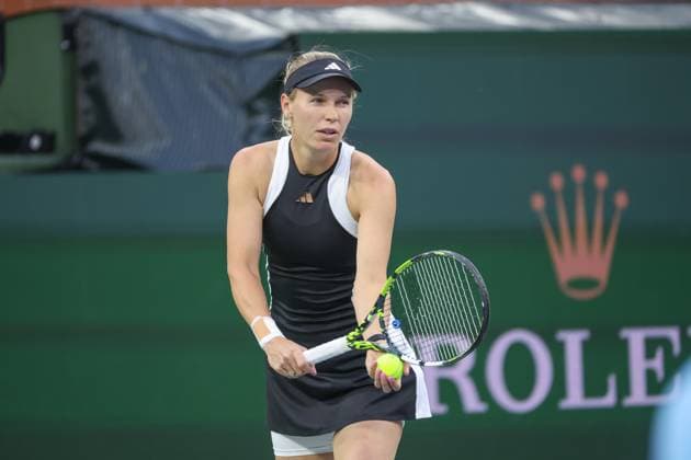 INDIAN WELLS, CA - MARCH 10: Caroline Wozniacki (DEN) serves during the BNP Paribas Open on March 10, 2024 at Indian Wells Tennis Garden in Indian Wells, CA. (Photo by George Walker Icon Sportswire) TENNIS: MAR 10 BNP Paribas Open EDITORIAL USE ONLY Icon240310119