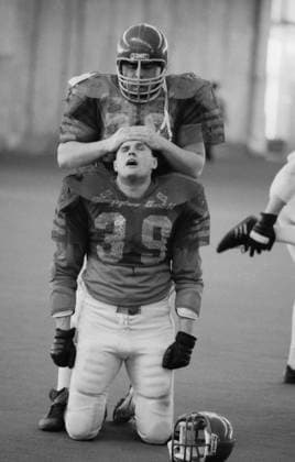 March 1-20, 1990. Moscow, USSR. Moscow team rugby player A. Biryukov (No.39, front) takes a rest during a break in the match between Moscow Bears and Krasnoyarsk Lions at the stadium of the Central Sports Club of the Army. The result of the match is 26:0 in favour of the Moscow Bears team. The exact date of the photograph is unknown. Igor Utkin TASS  18397043