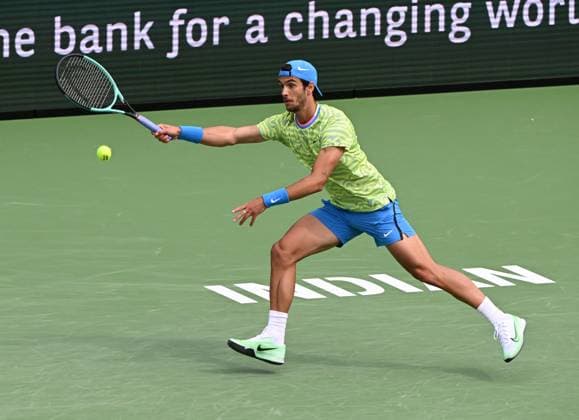 INDIAN WELLS, CA - MARCH 11: Lorenzo Musetti (ITA) chases after the ball during an ATP, Tennis Herren tennis match played on March 11, 2024 during the BNP Paribas Open played at the Indian Wells Tennis Garden in Indian Wells, CA. (Photo by John Cordes Icon Sportswire) TENNIS: MAR 11 BNP Paribas Open EDITORIAL USE ONLY Icon506240311019