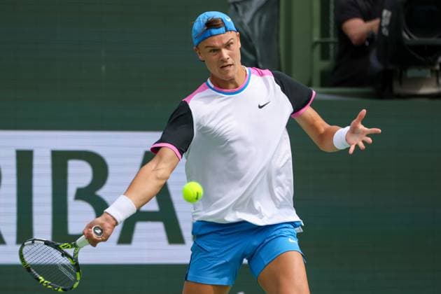 INDIAN WELLS, CA - MARCH 11: Holger Rune (DEN) hits a forehand during the BNP Paribas Open on March 11, 2024 at Indian Wells Tennis Garden in Indian Wells, CA. (Photo by George Walker Icon Sportswire) TENNIS: MAR 11 BNP Paribas Open EDITORIAL USE ONLY Icon240311017