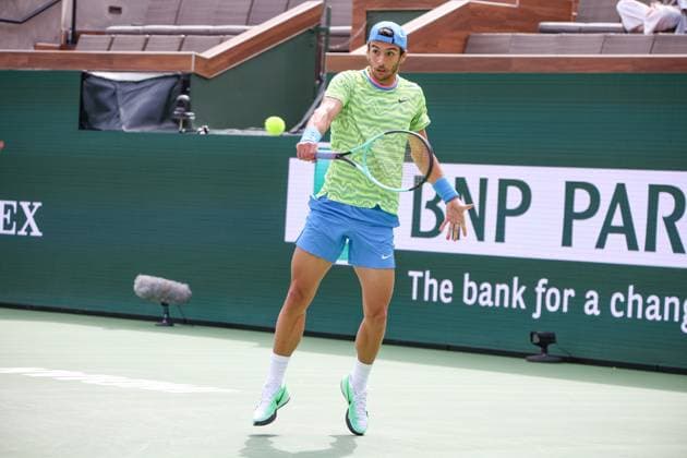 INDIAN WELLS, CA - MARCH 11: Lorenzo Musetti (ITA) hits a backhand during the BNP Paribas Open on March 11, 2024 at Indian Wells Tennis Garden in Indian Wells, CA. (Photo by George Walker Icon Sportswire) TENNIS: MAR 11 BNP Paribas Open EDITORIAL USE ONLY Icon240311022