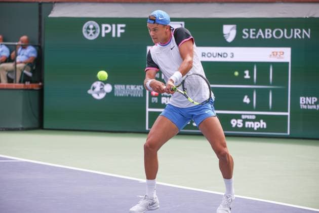 INDIAN WELLS, CA - MARCH 11: Holger Rune (DEN) hits a backhand during the BNP Paribas Open on March 11, 2024 at Indian Wells Tennis Garden in Indian Wells, CA. (Photo by George Walker Icon Sportswire) TENNIS: MAR 11 BNP Paribas Open EDITORIAL USE ONLY Icon240311029
