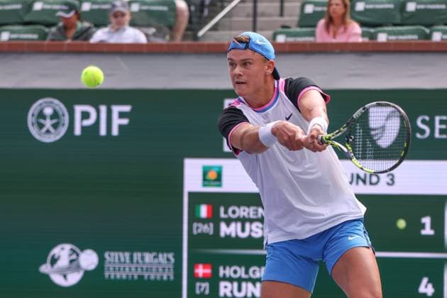 INDIAN WELLS, CA - MARCH 11: Holger Rune (DEN) hits a backhand during the BNP Paribas Open on March 11, 2024 at Indian Wells Tennis Garden in Indian Wells, CA. (Photo by George Walker Icon Sportswire) TENNIS: MAR 11 BNP Paribas Open EDITORIAL USE ONLY Icon240311035