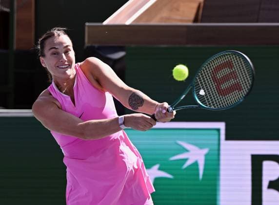 INDIAN WELLS, CA - MARCH 11: Aryna Sabalenka (RUS) returns the ball during a WTA, Tennis Damen tennis match played on March 11, 2024 during the BNP Paribas Open played at the Indian Wells Tennis Garden in Indian Wells, CA. (Photo by John Cordes Icon Sportswire) TENNIS: MAR 11 BNP Paribas Open EDITORIAL USE ONLY Icon506240311116