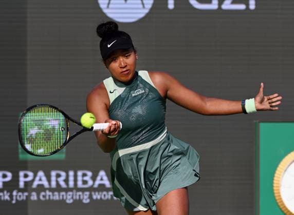 INDIAN WELLS, CA - MARCH 11: Naomi Osaka (JPN) returns the ball during a WTA, Tennis Damen tennis match played on March 11, 2024 during the BNP Paribas Open played at the Indian Wells Tennis Garden in Indian Wells, CA. (Photo by John Cordes Icon Sportswire) TENNIS: MAR 11 BNP Paribas Open EDITORIAL USE ONLY Icon506240311925