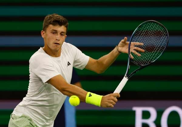 March 11, 2024 Luca Nardi of Italy returns a shot against Novak Djokovic of Serbia during the BNP Paribas Open in Indian Wells, CA. CSM Indian Wells United States of America - ZUMAc04_ 20240311_zma_c04_287 Copyright: xCharlesxBausx