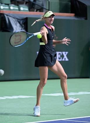INDIAN WELLS, CA - MARCH 12: Anastasia Potapova (RUS) returns the ball during a WTA, Tennis Damen tennis match played on March 12, 2024 during the BNP Paribas Open played at the Indian Wells Tennis Garden in Indian Wells, CA. (Photo by John Cordes Icon Sportswire) TENNIS: MAR 12 BNP Paribas Open EDITORIAL USE ONLY Icon506240312026