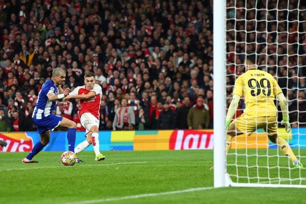 Leandro Trossard of Arsenal scoring a goal (1-0) Arsenal v Porto, UEFA Champions League, Round of 16, Second Leg, Football, Emirates Stadium, London, UK - 12 Mar 2024 EDITORIAL USE ONLY No use with unauthorised audio, video, data, fixture lists, club league logos or live services. Online in-match use limited to 120 images, no video emulation. No use in betting, games or single club league player publications. Copyright: xSimonxDael Shutterstockx 14384999o