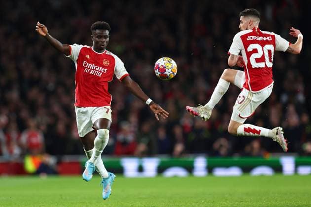 Bukayo Saka of Arsenal and Jorginho of Arsenal Arsenal v Porto, UEFA Champions League, Round of 16, Second Leg, Football, Emirates Stadium, London, UK - 12 Mar 2024 EDITORIAL USE ONLY No use with unauthorised audio, video, data, fixture lists, club league logos or live services. Online in-match use limited to 120 images, no video emulation. No use in betting, games or single club league player publications. Copyright: xSimonxDael Shutterstockx 14384999x