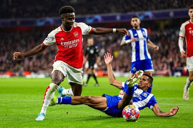 Arsenal v FC Porto Champions League 12 03 2024. Round of 16 Bukayo Saka (7) of Arsenal tussles with Galeno (13) of FC Porto during the Champions League match between Arsenal and FC Porto at the Emirates Stadium, London, England on 12 March 2024. Editorial use only , Copyright: xNigelxKeenex PSI-19227-0019