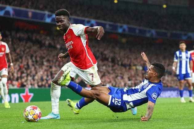 Arsenal gegen Porto 12. März 2024, London UEFA Champions™s League, Achtelfinale, Rückspiel Arsenal gegen Porto Bukayo Saka von Arsenal und Galeno von Porto Foto Charlotte Wilson Abseits London UK  Copyright: xCharlottexWilsonx xOffsidexOffside