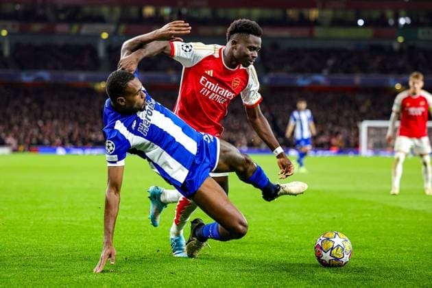 Arsenal v FC Porto Champions League 12 03 2024. Round of 16 Bukayo Saka (7) of Arsenal tussles with Otavio (31) of Porto during the Champions League match between Arsenal and FC Porto at the Emirates Stadium, London, England on 12 March 2024. Editorial use only , Copyright: xNigelxKeenex PSI-19227-0025