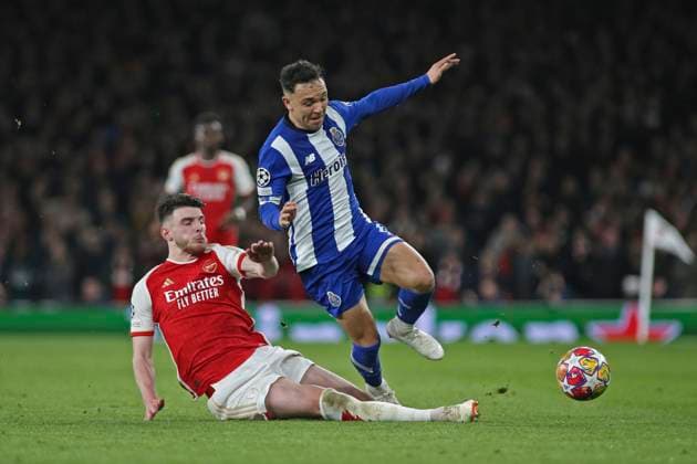 London, March 12th 2024: Declan Rice of Arsenal slide tackle on Pepe Cossa of Porto during the UEFA Champions League round of 16 second leg match between Arsenal and FC Porto at The Emirates Stadium, London, England. (Pedro Soares SPP) Copyright: xPedroxSoaresx xSPPx spp-en-PeSoSp-pedrosoares120324-075