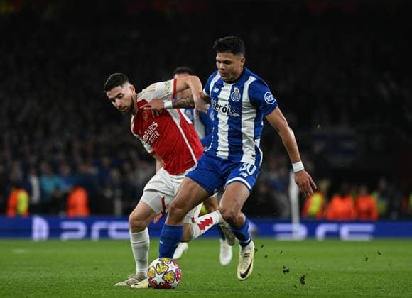 LONDON, ENGLAND - MARCH 12: Jorginho of Arsenal battles for the ball with Evanilson of FC Porto during the UEFA Champions League 2023 24 round of 16 second leg match between Arsenal FC and FC Porto at Emirates Stadium on March 12, 2024 in London, England.SPO 