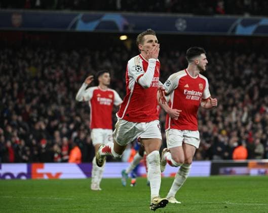 LONDON, ENGLAND - MARCH 12: Martin odegaard of Arsenal celebrates his sides second goal before it was ruled out during the UEFA Champions League 2023 24 round of 16 second leg match between Arsenal FC and FC Porto at Emirates Stadium on March 12, 2024 in London, England. SPO 