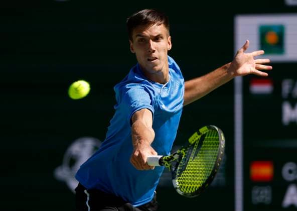 March 12, 2024 Fabian Marozsan of Hungary returns a shot against Carlos Alcaraz of Spain during the BNP Paribas Open in Indian Wells, CA. CSM Indian Wells United States of America - ZUMAc04_ 20240312_zma_c04_085 Copyright: xCharlesxBausx