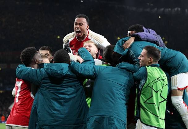 Gabriel jumps on his Arsenal teammates as they celebrate winning the game on a penalty shoot out Arsenal v FC Porto, UEFA Champions League Round of 16 2nd Leg, Emirates Stadium, Highbury, London, UK - 12 03 2024 Editorial use only  Copyright: xMattxImpey Shutterstockx 14386951q