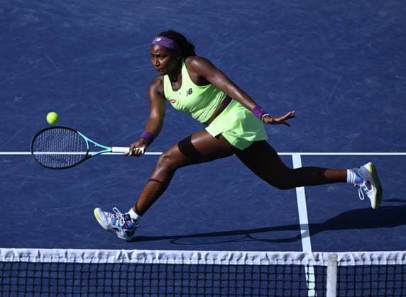 INDIAN WELLS, CA - MARCH 12: Coco Gauff (USA) chases after and returns the ball during a WTA, Tennis Damen quarterfinals doubles tennis match played on March 12, 2024 during the BNP Paribas Open played at the Indian Wells Tennis Garden in Indian Wells, CA. (Photo by John Cordes Icon Sportswire) TENNIS: MAR 12 BNP Paribas Open EDITORIAL USE ONLY Icon506240312216